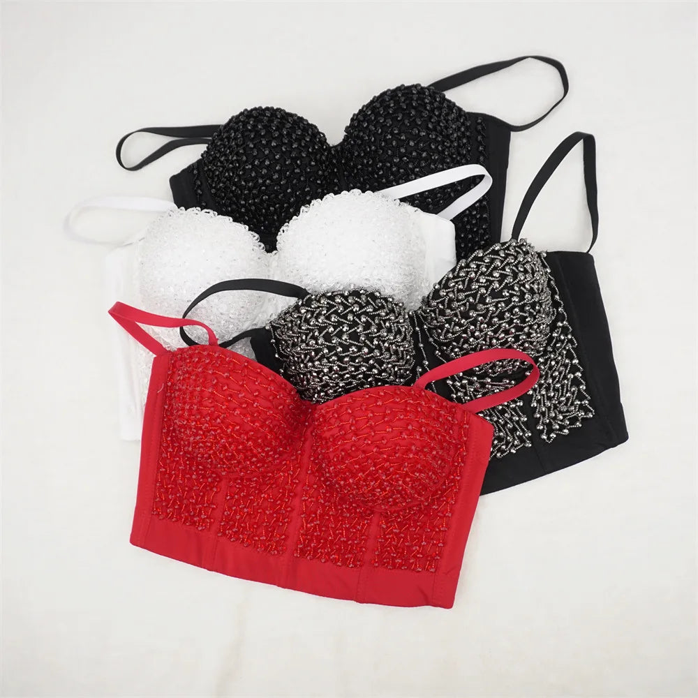 A women's stage performance outfit for the music festival with a halter top and glass beads wrapped around the chest, exposing t